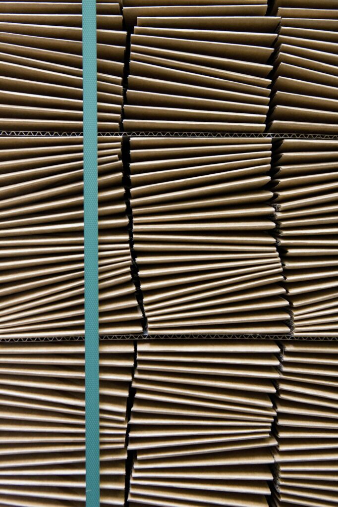 Close up of folded cardboard stock warehouse