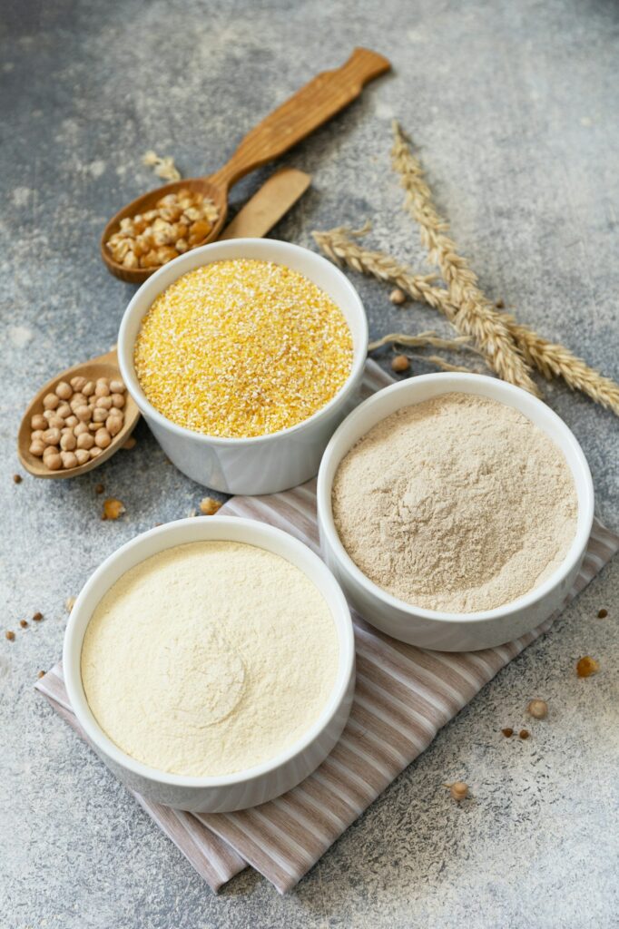 Food and baking gluten free ingredient. Cereals and flours coarse, corn flour, buckwheat flour.